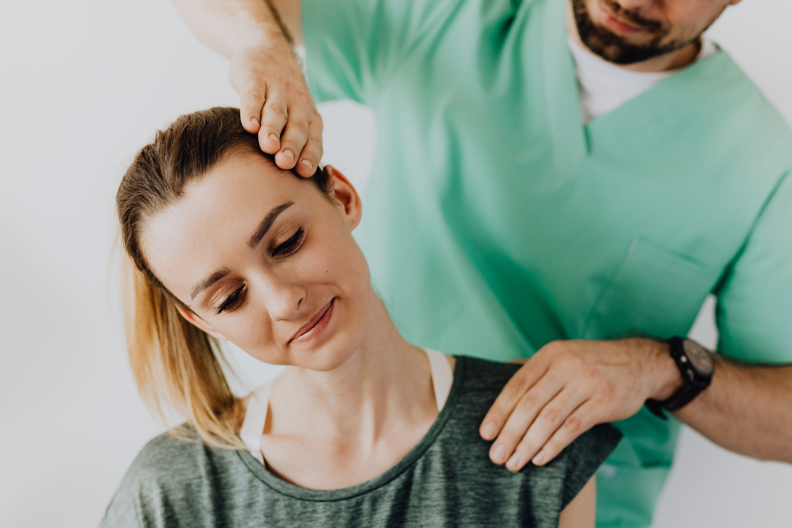 Physiotherapist treating a patient for spinal compression and nerve pain